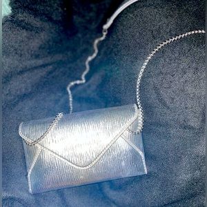 Zara small silver textured cross body. Card slots inside, fits most phones.